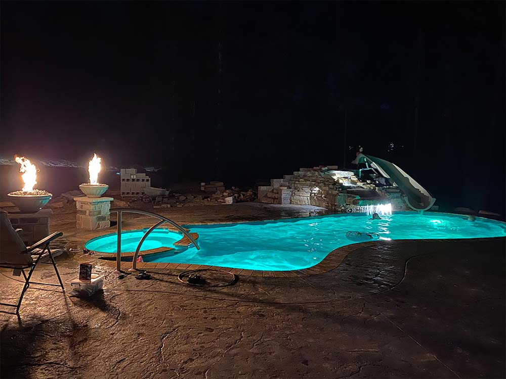swimming pool lights, night
