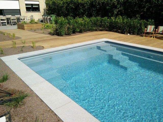Serene vinyl liner pool with natural stone accents