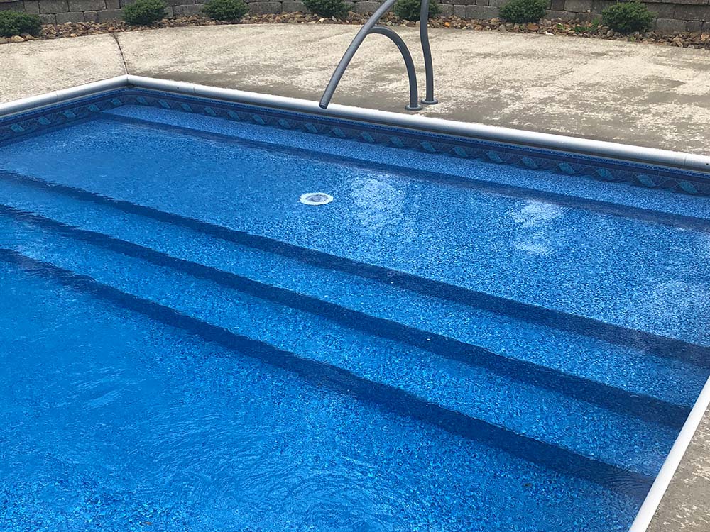 Contemporary vinyl liner pool with clean lines